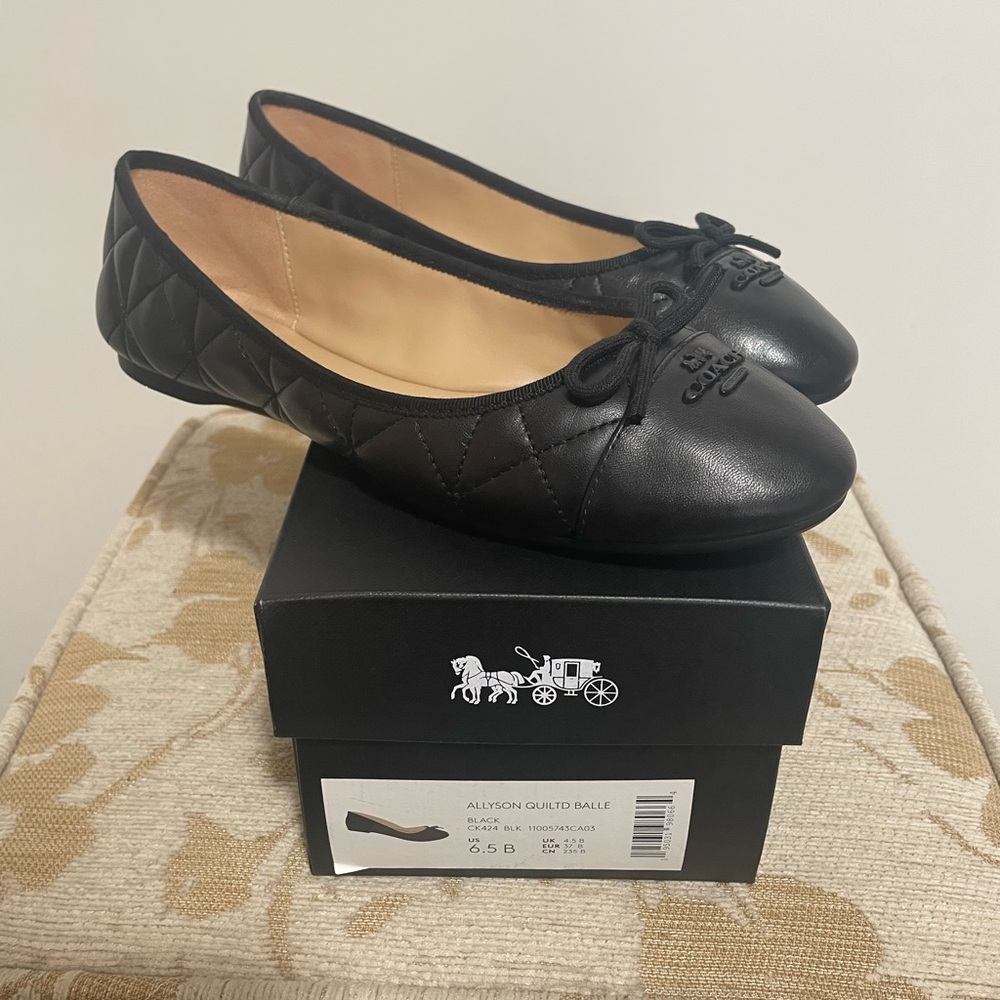 Coach black quilted flats